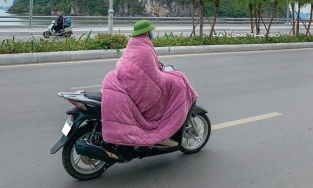 Muôn kiểu 'chạy rét' bá đạo của người dân khi gió đông về