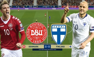 Tiền vệ Eriksen của Đan Mạch ngã gục xuống sân cỏ khi trận đấu đang diễn ra