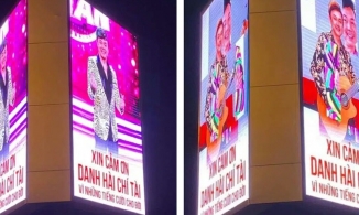 Xúc động hình ảnh cố nghệ sĩ Chí Tài trên biển quảng cáo lớn tại ngã tư Hàng Xanh