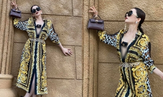 Lệ Quyên dát đồ hiệu từ đầu đến chân, phanh áo để đi rước đèn Trung thu