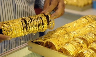 Giá vàng hôm nay 23/12: Vàng thế giới bất ngờ vượt ngưỡng 1.800 USD