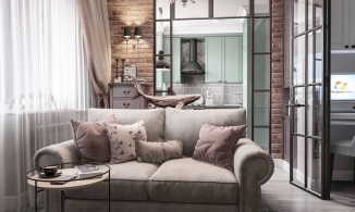 Căn hộ 38m² của cặp vợ chồng son với tường gạch trầm ấm và góc bếp màu xanh bơ tuyệt đẹp