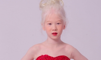 Chân dung người mẫu bạch tạng 8 tuổi trình diễn tại Tuần lễ thời trang Việt Nam 2020