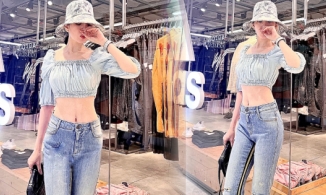 Lệ Quyên chụp ảnh cạnh đường thẳng để khẳng định mình 'cong' tự nhiên