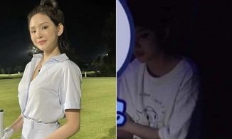 Hiền Hồ lộ diện giữa ồn ào 'mượn chồng', mắt nhắm nghiền, tay cầm vật lạ?