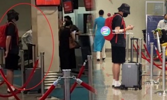 Kiều Minh Tuấn xỏ tất đi dép lê xuất hiện ở sân bay hậu ồn ào chia tay Cát Phượng