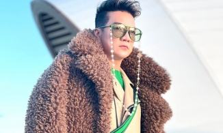 Trở lại làm đàn ông độc thân, Đàm Vĩnh Hưng tái xuất với áo lông, bắt trend xanh lá lime green