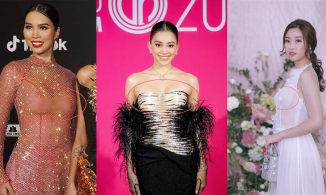 Hoa hậu Tiểu Vy chèn ép vòng 1 với váy xuyên thấu, lộ mút ngực trắng lốp dưới ánh đèn flash