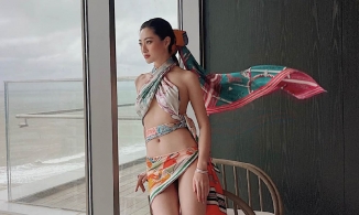 Chịu chơi như Hoa hậu Lương Thùy Linh, lấy khăn lụa làm đồ bơi khoe body cực phẩm 