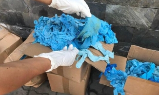 TP.HCM: Phát hiện 2 container găng tay y tế bẩn nhập từ Trung Quốc