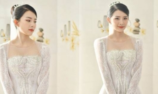 Sau áo dài 40 triệu, vợ Phan Mạnh Quỳnh tiếp tục diện váy cưới 87,5 triệu