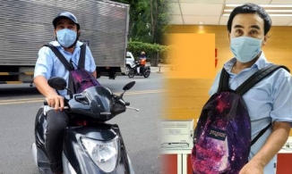 MC Quyền Linh đi xe máy, khoác balo, trực tiếp mang 2,2 tỷ đồng ủng hộ quỹ vắc xin