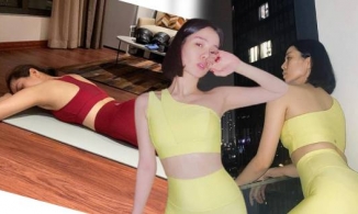 Lệ Quyên nằm trườn tạo dáng chân co chân duỗi chụp ảnh selfie