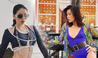 Đứng thôi chưa đủ, Lệ Quyên phải nằm trườn ra chụp ảnh để 'tạo nét'