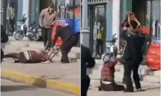 Lộ clip cảnh chồng đánh chết vợ trên đường phố Trung Quốc