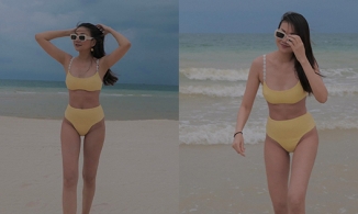 U40 Thanh Hằng khiến fan 'nghẹt thở' với loạt ảnh thả dáng trên bãi biển