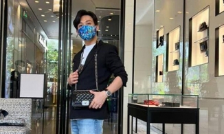 Đại gia Minh Nhựa tự tay đi mua túi xách nửa tỷ cho bà xã dịp Valetine