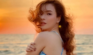 MC Đan Lê khoe sắc vóc trẻ đẹp tuổi U40 dưới ống kính của ông xã