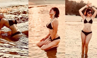 Thanh Hương ngày càng quyến rũ, đứng trước biển nhưng eo con kiến mới hút mọi ảnh nhìn