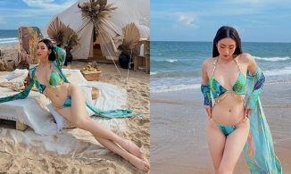 Lương Thùy Linh diện áo tắm 2 mảnh tạo dáng nàng tiên cá, khoe trọn đôi chân 1m22