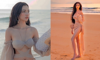 Cẩm Đan diện đầm cắt xẻ, đẹp như nữ thần trên bãi biển