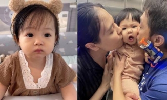 Biểu cảm 'khó đỡ' của Suchin khi 'bị' bố mẹ yêu