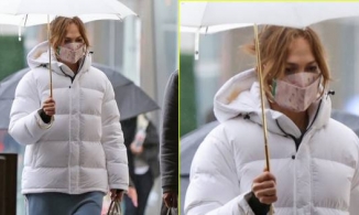 Vắng Ben Affleck, Jennifer Lopez để mặt mộc, một mình đi dưới mưa rét