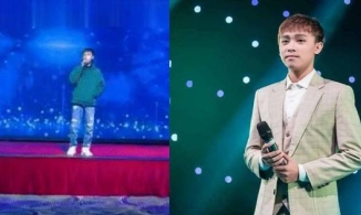 Hồ Văn Cường ăn mặc tuềnh toàng, bỏ tay túi áo khi đứng hát trên sân khấu