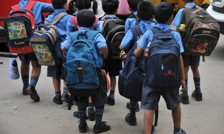 Chuyện gia Mỹ cảnh báo mối nguy hại đối với trẻ em từ chiếc cặp sách