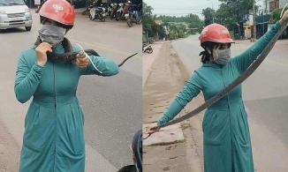 Hình ảnh cô gái nhỏ nhắn, tay không bắt 'bé Na' to đùng khiến cư dân mạng phát hoảng