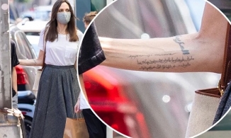 Nữ diễn viên Angelina Jolie khoe hình xăm mới khó hiểu trên tay