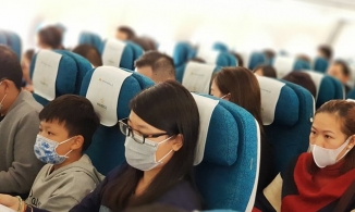Không đeo khẩu trang khi đi máy bay sẽ bị phạt tới 3 triệu đồng