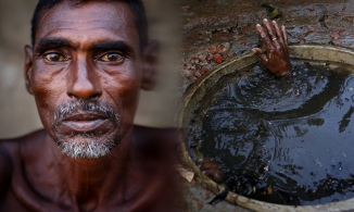 Câu chuyện đầy cảm xúc đằng sau bức ảnh hơn 600.000 like về một người bố làm công việc 'bẩn thỉu nhất thế giới' 