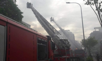 TP. HCM: Giải cứu 2 người mắc kẹt trong căn nhà bị cháy