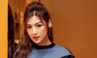 Á hậu Tú Anh trông khác lạ khi để kiểu mái ngang