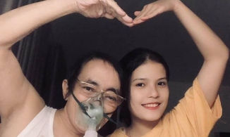 Nghệ sĩ Giang còi chụp ảnh vui vẻ cùng con gái dù phải đeo ống thở oxy