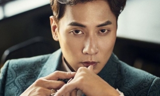 Em út Shinhwa kết hôn với bạn gái kém 9 tuổi