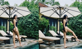 Văn Mai Hương diện áo tắm, vòng 3 cong vút bên hồ bơi