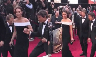 Công nương Kate được Tom Cruise dìu tay lên thảm đỏ nhưng biểu cảm của cô mới chiếm spotlight