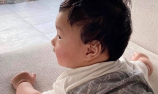 Hoa hậu Đặng Thu Thảo lần đầu khoe con trai 6 tháng tuổi đã biết gọi ba