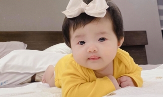 Đông Nhi khoe loạt ảnh cận mặt con gái Winnie