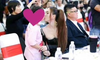 Ngọc Trinh gây tranh cãi khi hôn môi diễn viên nhí 8 tuổi