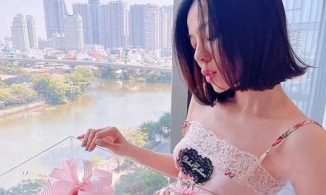 Lệ Quyên hạnh phúc khoe hoa xinh ngày 8/3, còn gọi tình trẻ bằng 'cục cưng'