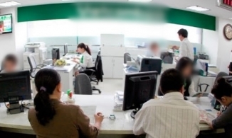 TP.HCM: Dùng chứng minh nhân dân giả, ký thay để rút tiền ngân hàng