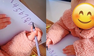 Bất ngờ với em bé mới 14 tháng tuổi đã cầm bút viết được chữ số thoăn thoắt