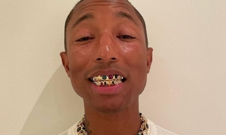 Pharrell Williams 'chơi lớn' đính kim cương và đá quý lên cả hàm răng