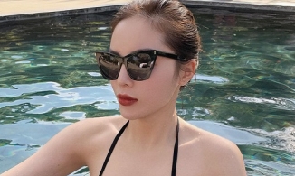 Hoa hậu Kỳ Duyên khoe làn da phát sáng dưới hồ bơi