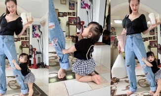 Con gái Đông Nhi đu chân mẹ không cho đi làm