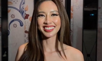 Thùy Tiên ghi điểm với màn hát tiếng Thái trên livestream của Miss Grand 