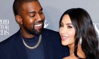 Kanye West van xin Kim Kardashian quay lại trước hàng chục nghìn khán giả